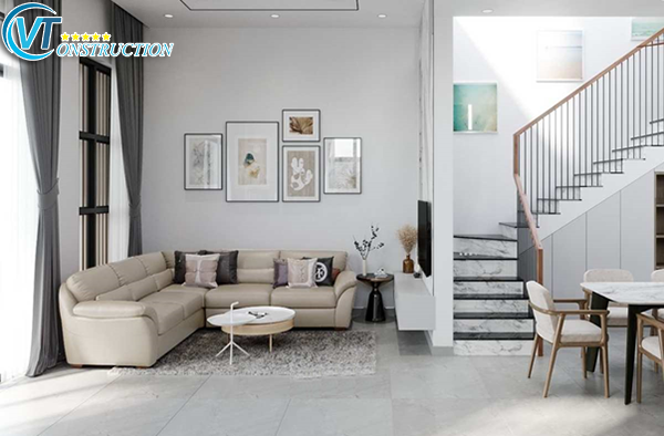 Sofa sáng màu góp phần tạo sự cân bằng và ấm cúng cho phòng khách